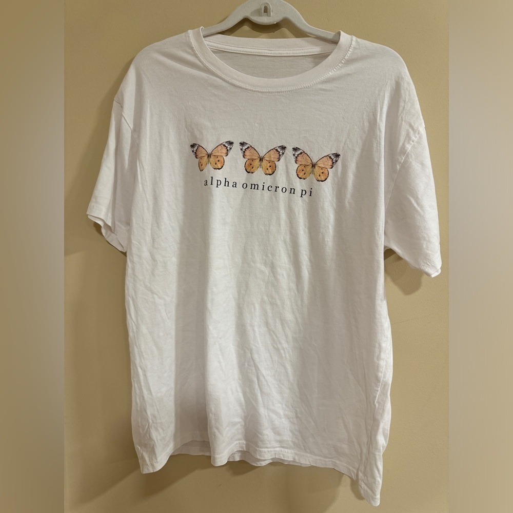 Alpha Omicron Pi white and orange butterfly top​​